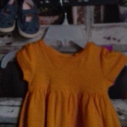 THIS IS FOR A BRAND NEW BUNDLE OF GIRLS CLOTHES

1 X ORANGE DRESS FROM NEXT 
1 X PAIR OF BLUE MOUSE SHOES FROM NEXT

PLEASE SEE PHOTO