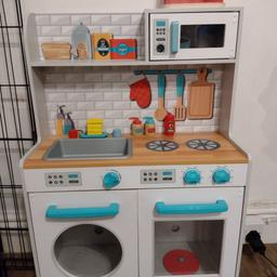 kids toy kitchen well played with but still has life left in it. the tap is missing and my puppy decided to chew the knobs on it. cash and collection only.