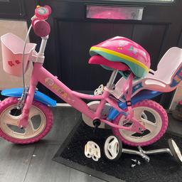 Peppa pig bike with Helmet. Comes with stabilisers. Bike could do with a clean but haven’t been able to get the pressure washer out. Selling as my daughter needed a bigger bike.