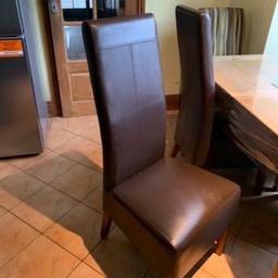 Dining chairs x4 in good quality Brown Faux Leather. Two are in much better condition than others . No rips but cat scratches on them. Solid frames . Ideal reupholster project or can be used as is. 

Will separate in pairs if required. 

Collection from BD9 area of Bradford or can deliver locally for £10 ; but only if paid for in advance. 

Tel 07971830592