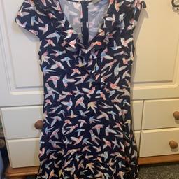 Ladies knee length dress, navy blue with bird print, from Oasis, UK size 8
Excellent condition, like new.

If postage is required then postage costs will be added.