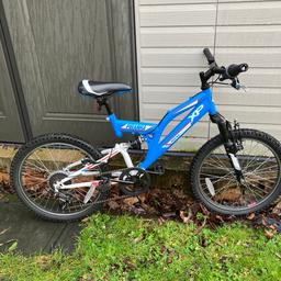 Kids blue 20 inch Piranha mountain bike

6 gears with twist grip shifters

Dual suspension

Adjustable seat and handlebar

Tyres are intact

Overall bike is in Good condition

Back brake and cable needs attention

Cash on collection
