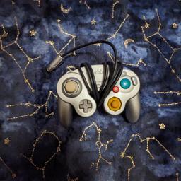 Original game cube silver wired controller. All working when last checked and still original parts. Collection or delivery at buyers cost. Offers accepted on multiple items.