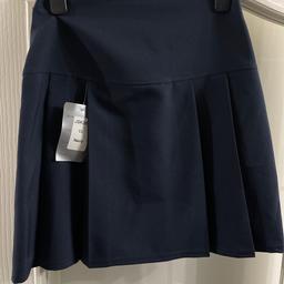 Brand new age 13 navy blue skirt. Elasticated waist back band. Cost £9.99