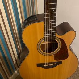 TAKEMINE electro acoustics  guitar GN10ce excellent condition . Looks new. Cost 300 new. Built in TAKEMINE electrics and tuner.  Treat yourself to a TAKEMINE . Must collect