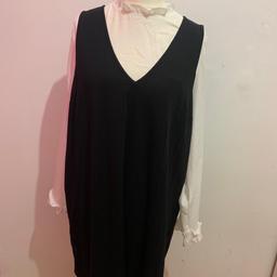 Dress in excellent condition like new., 2 in one very flattering and comfortable.