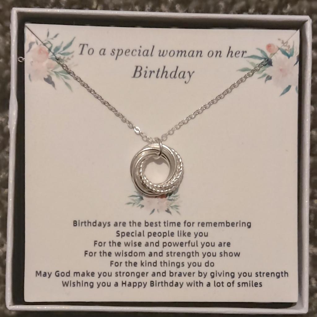 Silver hoop necklace, ideal gift or treat has a birthday wishes card on it. Best wishes for you. Lovely beautiful necklace. It comes with a for you card and a gift box. You can write a message on it if you're gifting it to someone. The chain is 20 inch long (51cm)