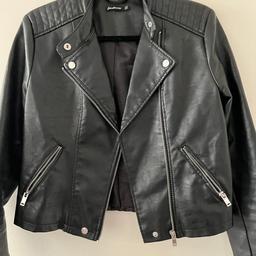 Hi and welcome to this beautiful looking ladies Stradivarius Faux Leather Biker Jacket Size Small in perfect condition thanks