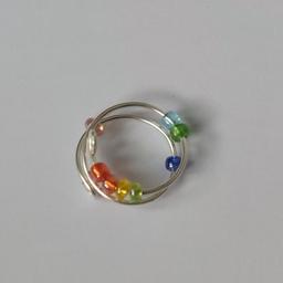Colourful anxiety ring, brand new with a message card and a fancy gift box for whatever the accession. Rainbow beads, fidget ring, sterling silver high quality material, helps you better with focusing your attention when thinking, collection only
