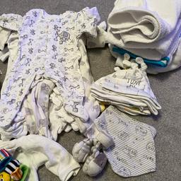 A selection of new born neutral clothing. Sizes 0-1 and 0-3/newborn. 

Includes 

3 towels (one brand new)
Sleep grow 
12 baby grows
23 Vests (some brand new) 
Cardigan, bib, rattles
Muslins
7 hats

From mostly next and marks and Spenser

Collecting B35