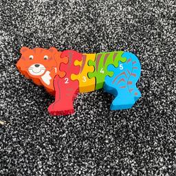 Beautiful wooden jigsaw with 5 pieces in wonderful colours. Shape of a Tiger. Pet/smoke free home. Collection only. REDUCED 