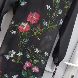 casual wear dress in good condition material is soft chiffon goergtte size is 12 and length is 33 £3. what'sap number 07741758931