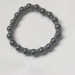 Beaded black and silver bangle bracelet it comes with a gift box. fancy trendy.