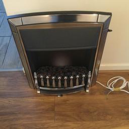 Convector electric heater, gas fire look alike
with coals 2 settings