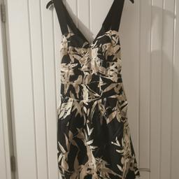 Warehouse dress. Very good condition. From Warehouse. It has Elasticated straps and a fitted bodice. Size 10
