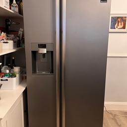 Samsung American fridge freezer with water and ice maker. In excellent condition. All working. Selling as bought a new kitchen with integrate freezer and fridge.