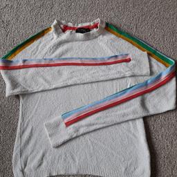 Topshop cream cropped stretchy jumper with rainbow stripe colours on shoulders and down arms. Cotton, polyamide, acrylic and viscose mix. Size 8. Used condition, some bobbling. From smoke and pet free home. Check out my other items,happy to combine postage for multiple purchases or collection from DL5. Thanks for looking.