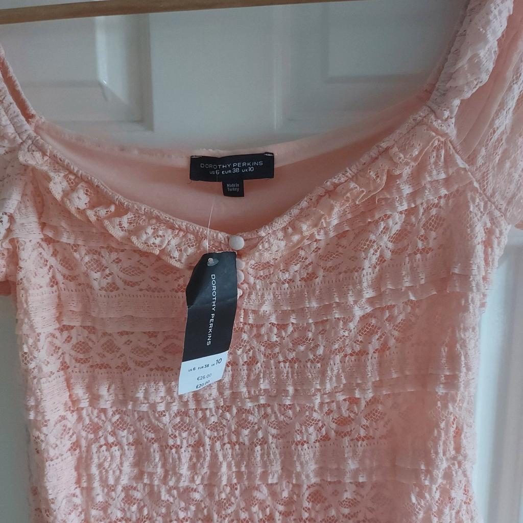 Both new condition
The striped top is by river island and unworn,size 10 but baggy fit

The peach lace top is by Dorothy perkins and is size 10 with original label on
NO LOWER OFFERS THANKS
Please bid £2 per item