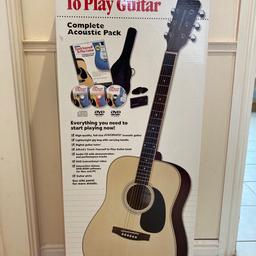 Complete Acoustic guitar set.
Great starter pack.
New and never used gift still in its box