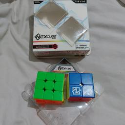 Mo Yu Nexcube 3D puzzles , selling a set of 3x3 and 2 x 2 with show stand .used but in excellent condition.