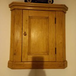 wall mounted antique pine corner cuboard .Lovely piece and will enhance any room .