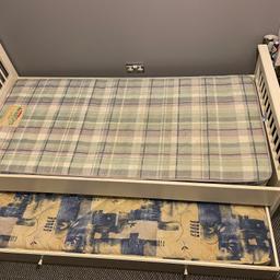 Single bed with another single bed that slides underneath, good condition comes with mattresses, collection only