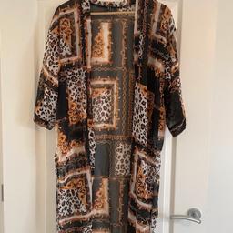 Lovely kimono never been worn size 10/12 collection only from b23