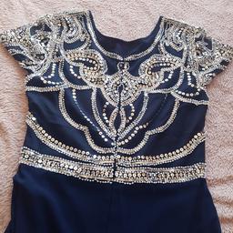 size 10 navy maxi dress with silver and white bead work. worn only the once.