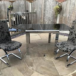 FREE

Black glass and silver metal table and chairs in used condition.
4 chairs are silver and black floral patterned fabric.
Table is 90cm x 90cm. Extended it doubles in size.

This will be dismantled for collection.

COLLECTION FROM LEEDS 26. CAN NOT DELIVER.