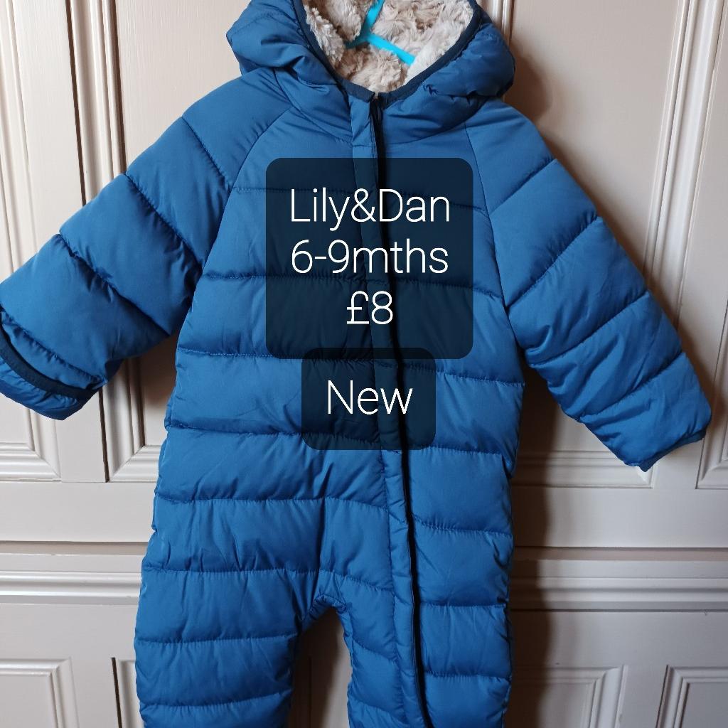 NEW LOVELY SNOW SUITE. FUR LINED THROUGHOUT. HAS TURNED OVER CUFFS ON HANDS AND FEET IF REQUIRED. HAS ZIP ALL THE WAY DOWN LEG SO EASIER TO PUT ON AND TAKE OFF.