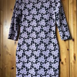 Black and pink fitted body con style dress with 3/4 sleeves, sits just above the knee, by River Island, size 10.
Only worn once so still in very good condition.