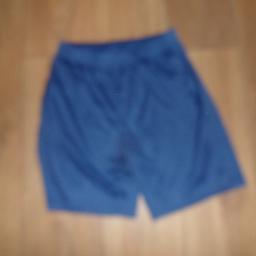 A BLUE PAIR OFSTRETCHY ELASTICATED WAIST SHORTS SIZE  12/13 YEARS