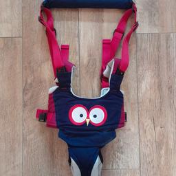 walking harness, Blue and red with owl eyes on the front. Saves back breaking and helps to aid baby walk. Fully supports baby when first standing, when baby is more sturdy and taking more steps unzip and it just gives support around the waist. This is great, especially for walking outside when they are unable to walk independently.