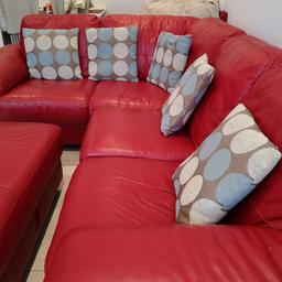 DFS leather sofa. Red colour. L shaped 5 seater + single electric Recliner + foot stool. 
Comes with leather cleaning kit from DFS