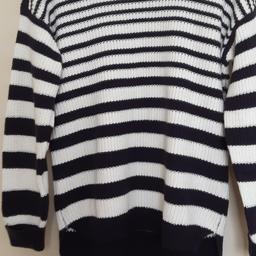 Brand new marks and Spencer blue and white stripe jumper. 100% cotton, approx measurement: armpit to armpit 50cm, length on front from shoulder down 57cm and the back 67cm.