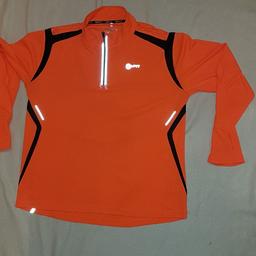 Mi Fit Running Top. XL in great condition. Fluorescent orange with reflecting strips. See photos for condition and size. I can offer try before you buy option but if viewing on an auction site viewing STRICTLY prior to end of auction.  If you bid and win it's yours. Cash on collection or post at extra cost which is £4.55 Royal Mail 2nd class signed for. I can offer free local delivery within five miles of my postcode which is LS104NF. Listed on five other sites so it may end abruptly. Don't be disappointed. Any questions please ask and I will answer asap.
