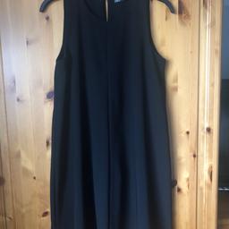 Black loose fit dress In lovely quality non iron material by Zara, size Small.
Hardly worn so still in very good condition.