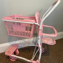 Kids toy trolley and baby seat.
Basket is also removable aswell as is the bath seat.