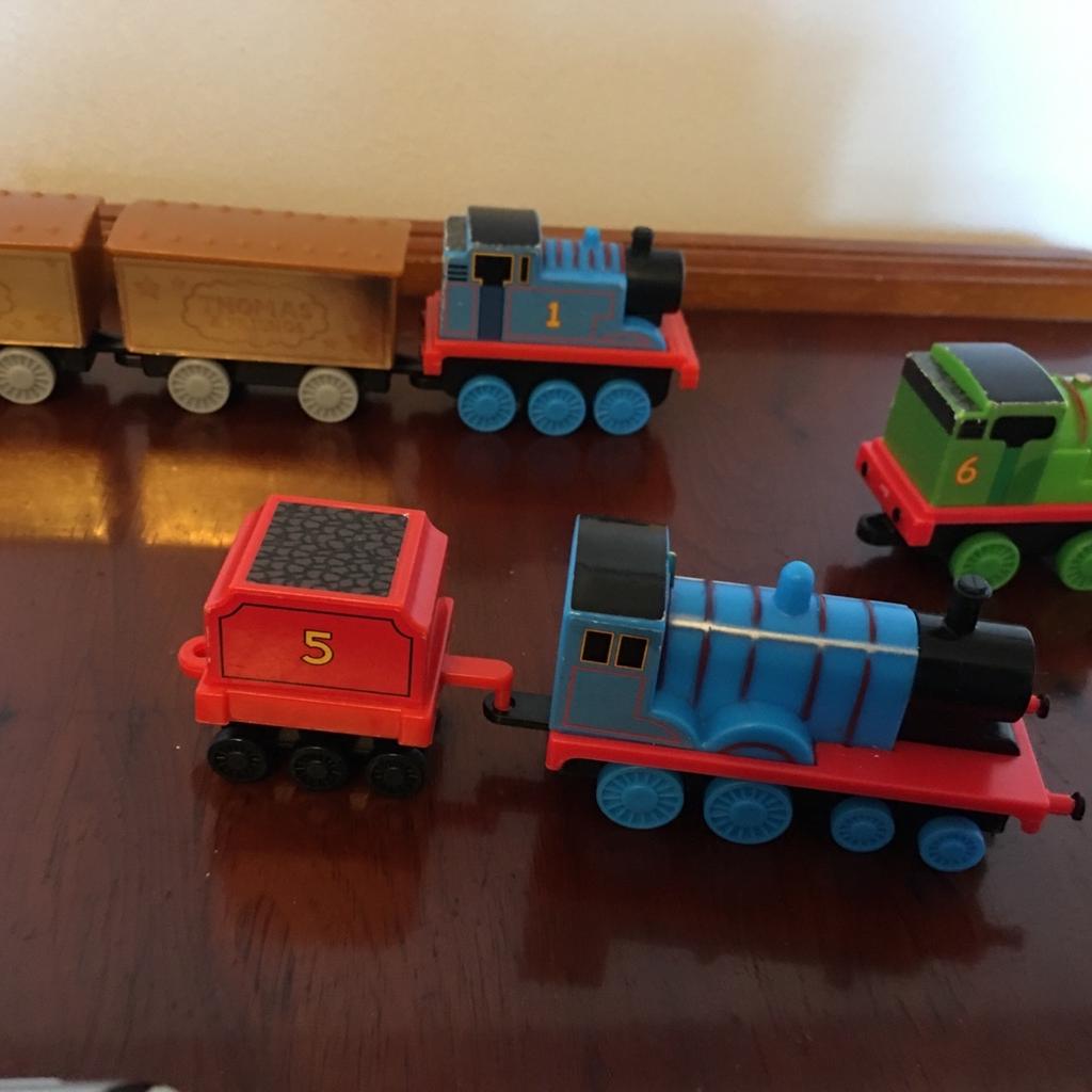 Small Thomas trains and carriages,to small for a wooden track train but ideal for original Thomas and friends train track.collection only