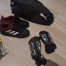 everything in the picture for £10
my son no longer play football hardly used gloves am alittle bit dirty but perfect
Adidas football boots size 1