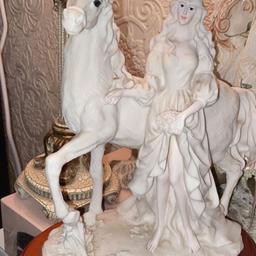 Beautiful fairy tale horse with fairy tail lady in great condition just a small chip in the varnish not the wood