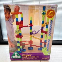 EL extreme marble madness. 49 pieces & 9 marbles. Age 3-7 years. Good condition apart from box has been repaired with celotape. Buyer to collect from Bexley.