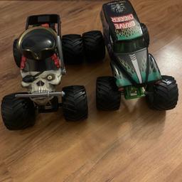 2 large monster trucks in good condition