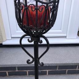 Beautiful candle holder in wrought iron lovely feature inside or out 40. “ high 19” inch base collection only DY5 area