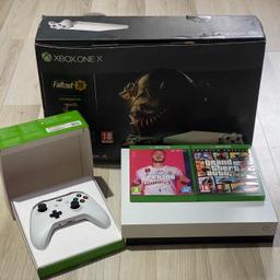 White Xbox One X 1TB
Perfect working condition !!
No issues at all !!

CAN BE SEEN WORKING !!

The xbox one X comes with
1 x Wireless Controller
2 x games
HDMI
Power
Original Box

CAN BE DELIVERED FOR SMALL FEE !!