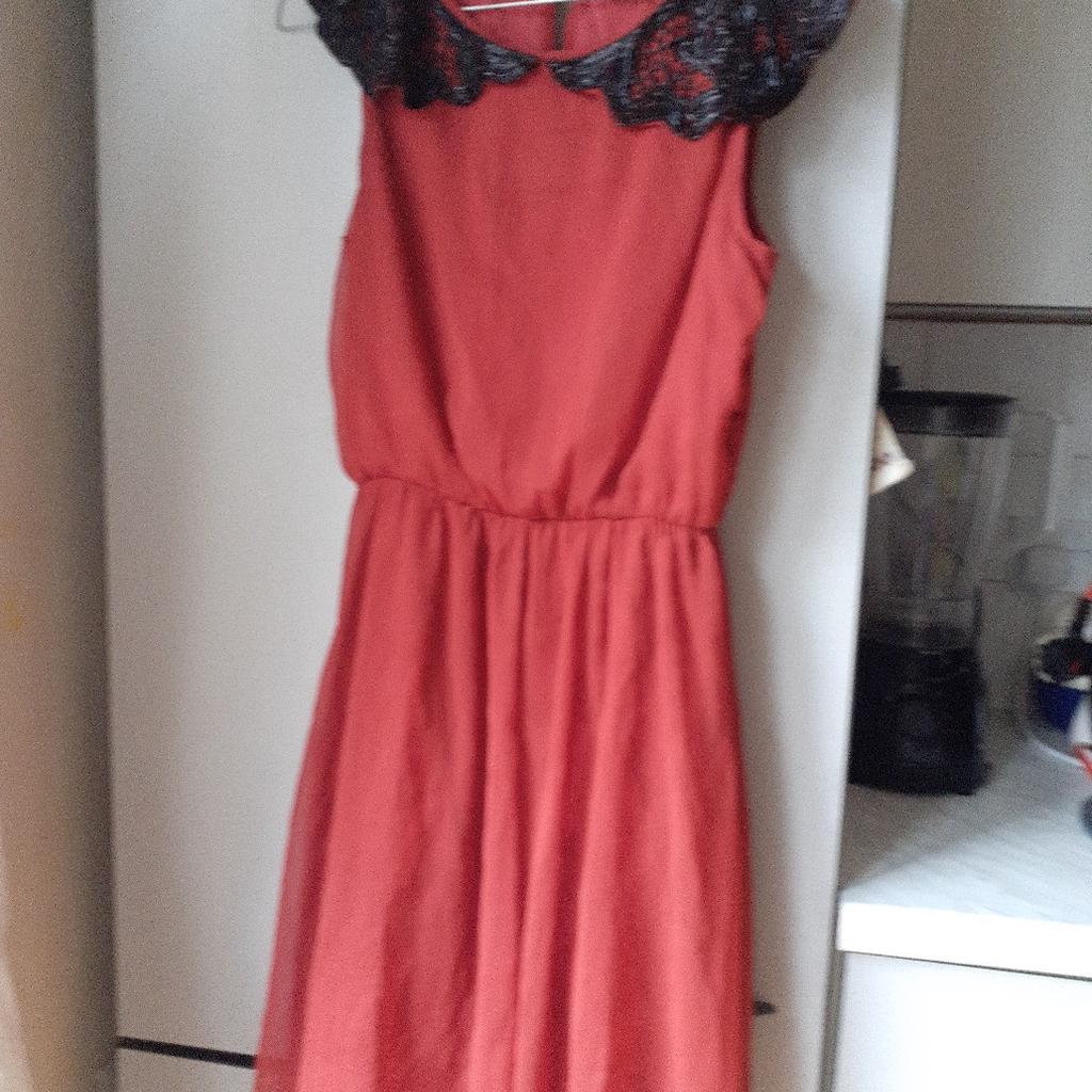 ladies dress been worn once in very good condtion size 10/12 from top shop length of dress 37ins long from top of dress to bottom