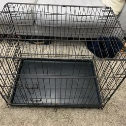 Black dog crate.
Width 75cm
Depth 52cm
Height 61cm
Two doors
Pull out tray
