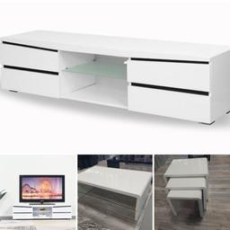 High gloss TV unit, coffee table and nest of tables.

flat packed item