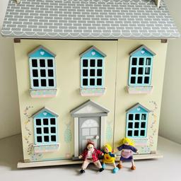 Gorgeous large wooden dolls house with opening doors, windows and roof. Comes with 3 wooden figures and staircase inside as shown in the photographs. This is in excellent condition, it’s heavy and sturdy and has many many years of play in it. May have some marks/signs of use but it’s in excellent condition overall.