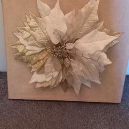 A  Large faux Suede Wall  Art  With 3D Effect flower Arrangement  In Cream  &  Gold  Its used condition  , a very slight mark but other than that in good condition , around 20 inch square , COLLECTION ONLY